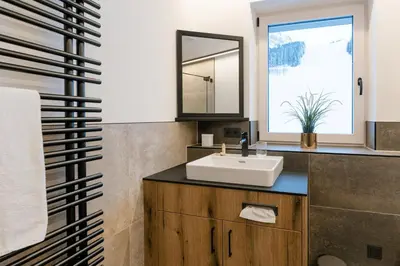 Ein Badezimmer in der Unterkunft ANN SUITES Appartements