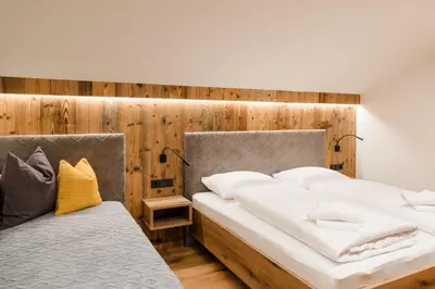 Ein Bett oder Betten in einem Zimmer der Unterkunft ANN SUITES Appartements