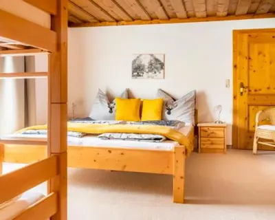 Ein Bett oder Betten in einem Zimmer der Unterkunft Unterwöhrlehen