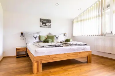 Ein Bett oder Betten in einem Zimmer der Unterkunft Unterwöhrlehen