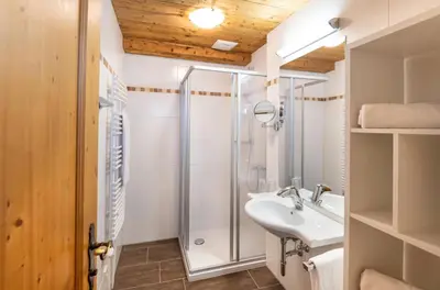 Ein Badezimmer in der Unterkunft Apparthotel Kirchgasser
