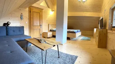 Ein Bett oder Betten in einem Zimmer der Unterkunft Siegel Almhütte