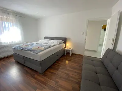 Ein Bett oder Betten in einem Zimmer der Unterkunft Ferienwohnung Beatrix