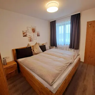 Ein Bett oder Betten in einem Zimmer der Unterkunft Landhaus Stadlmann